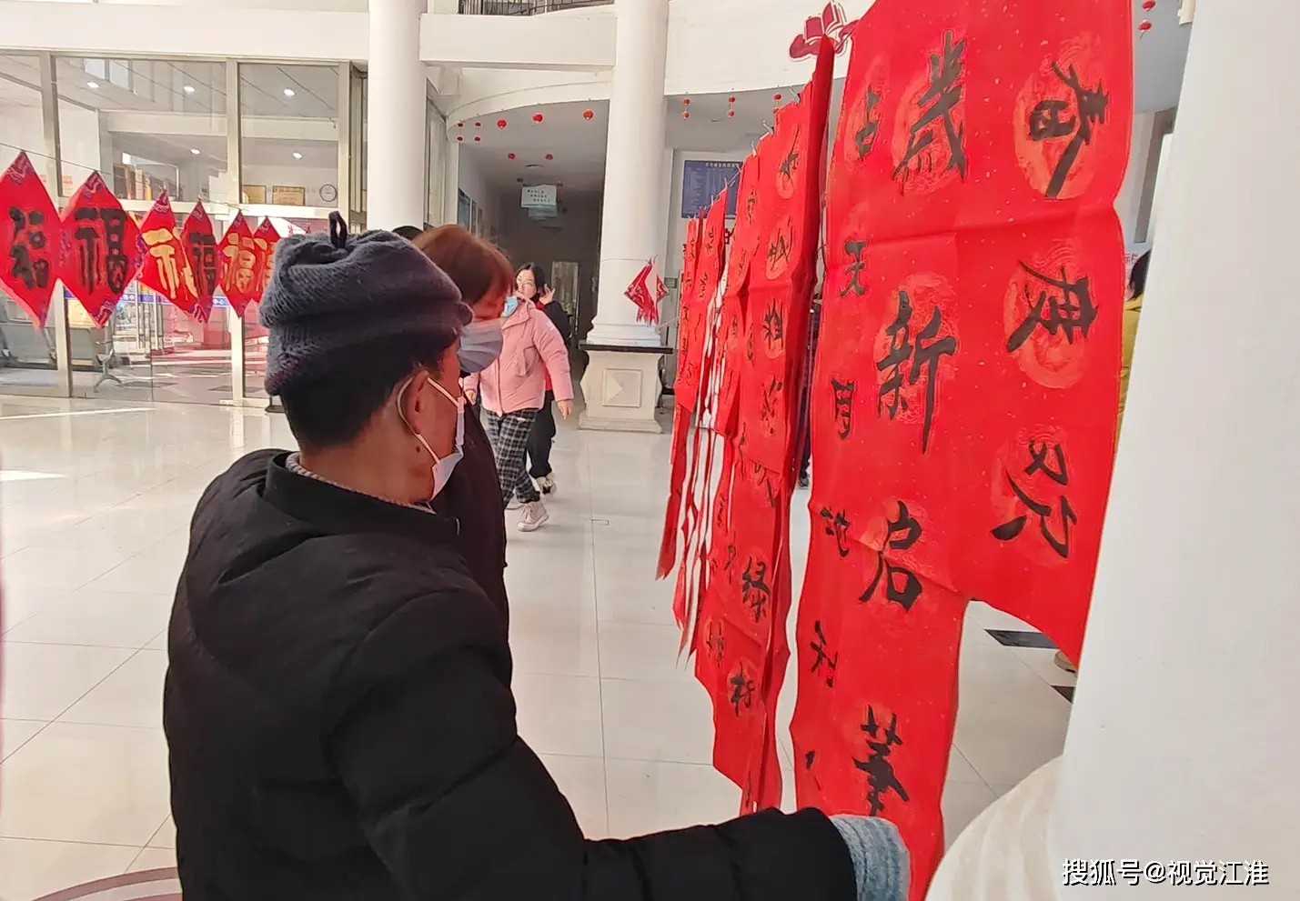 蚌埠市龙湖春天社区春节书画活动_蚌埠市易联创业互助协会文化盛宴_蚌埠龙湖社区